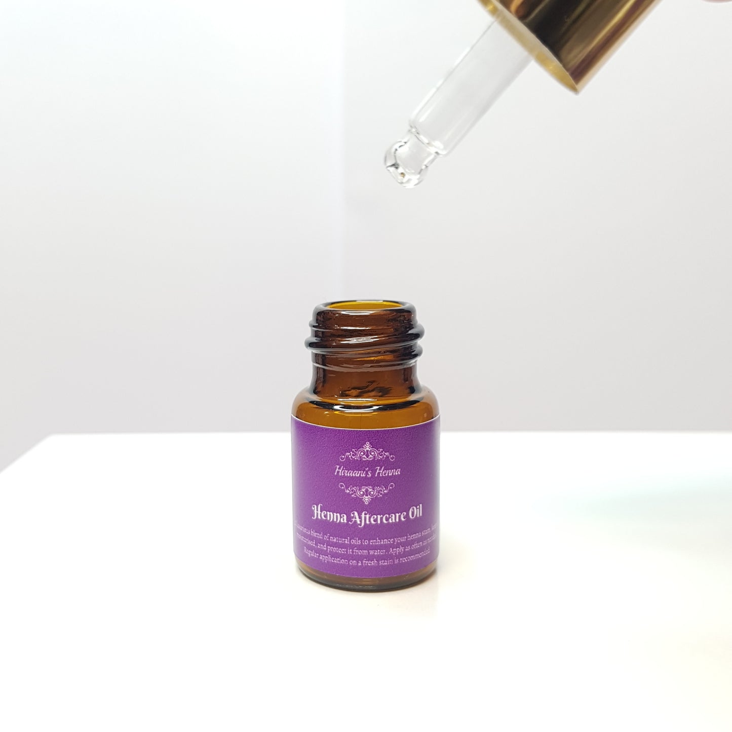 Henna oil in glass droppee bottle